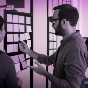 a web designer debating his idea with others in front of a board full of sticky notes