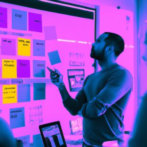 a web designer debating his idea with others in front of a board full of sticky notes